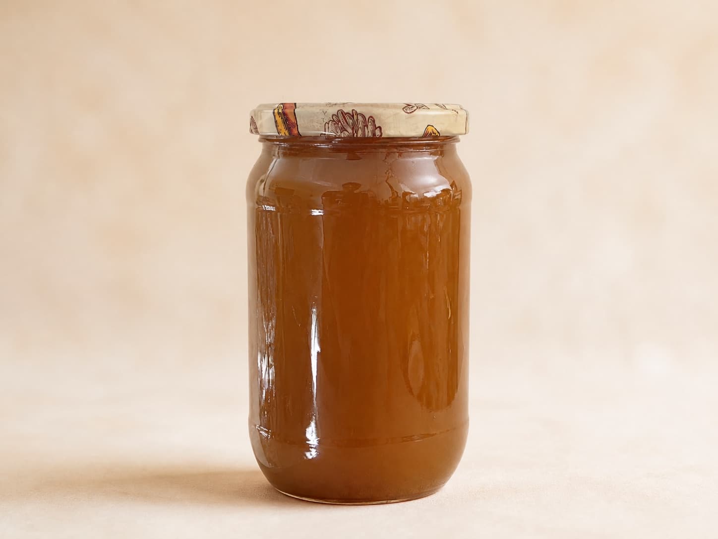Photograph of a 1kg jar of Baba's Bees pure honey
