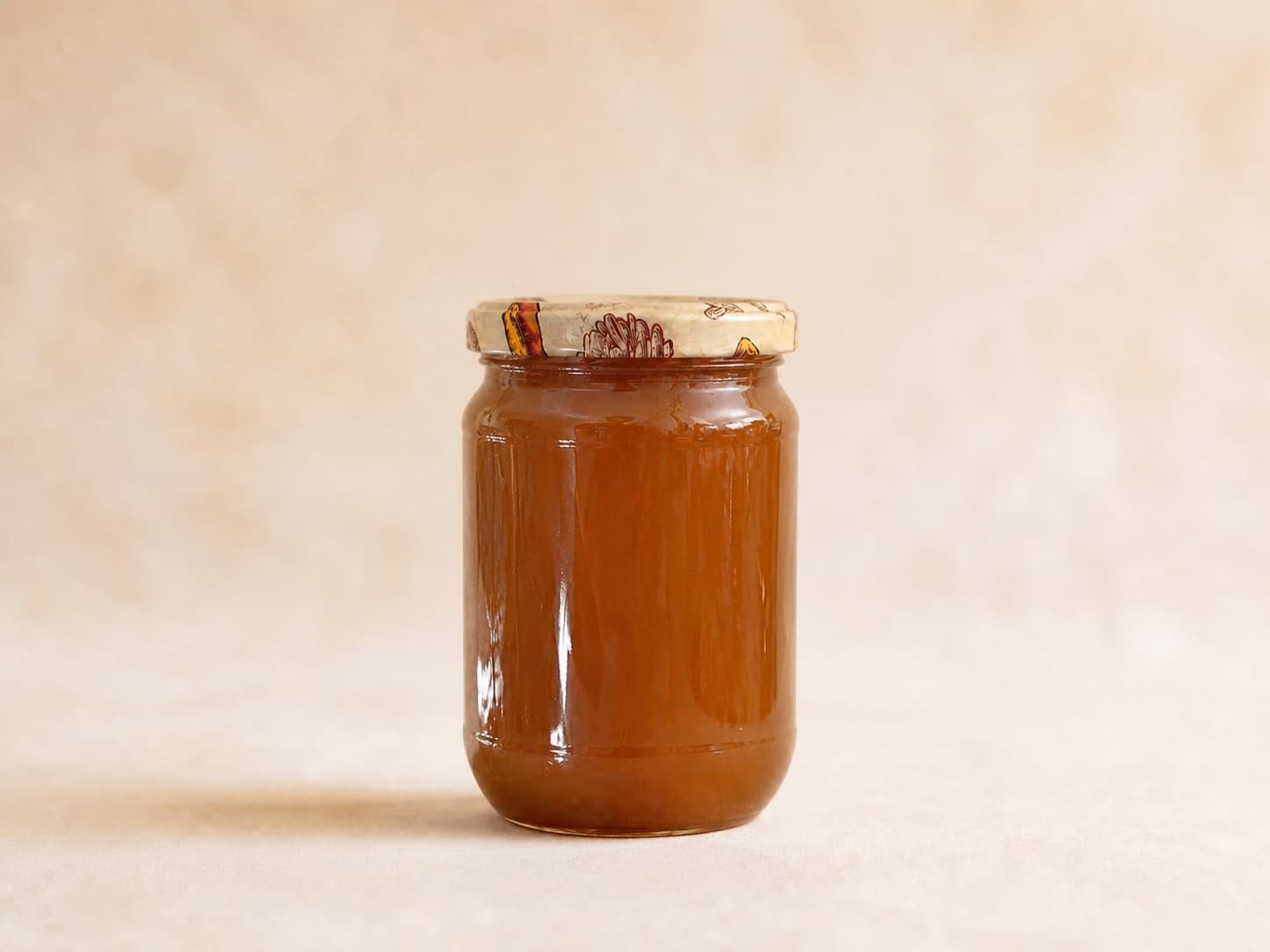 Photograph of a 500g jar of Baba's Bees pure honey